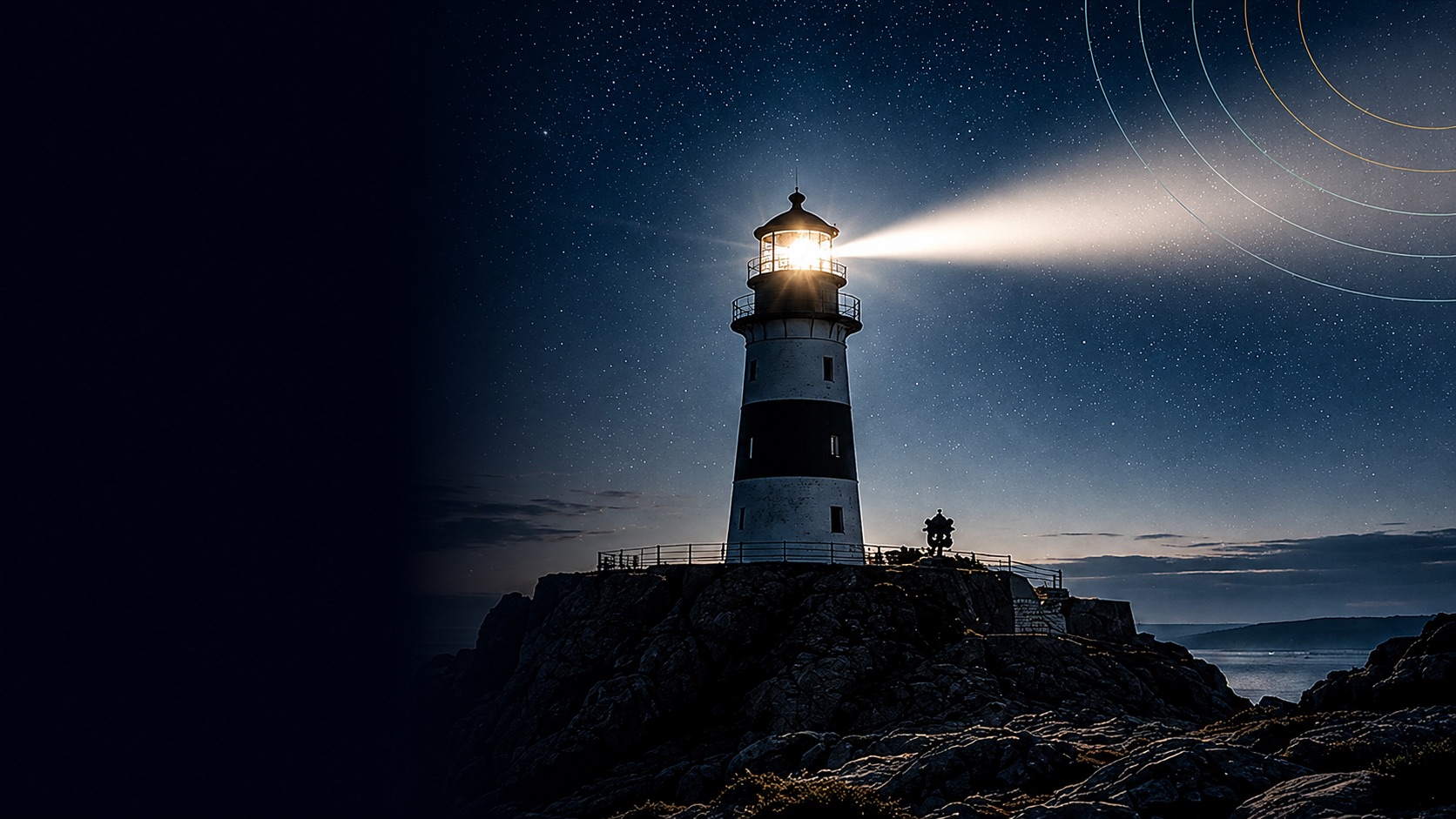 Lighthouse shining over the sea at night
